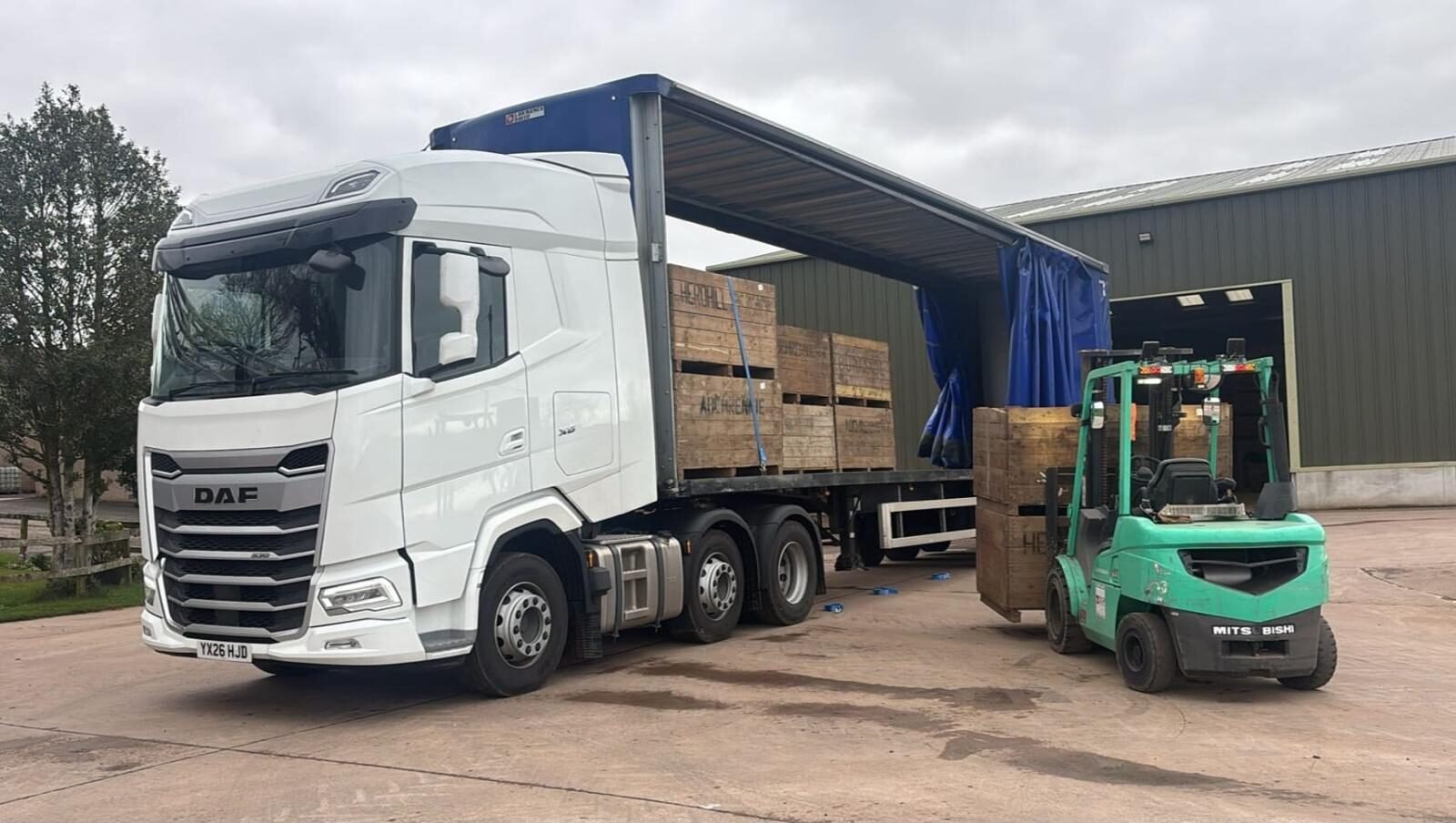 TES curtainsider being loaded by forklift at the depot